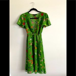 Deep cut floral wrap dress